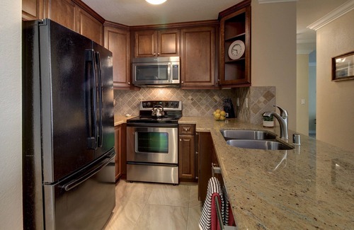 Townsite Condo | North Coast Village Retreat B111 Gated condo w/pool, hot tub, gym, putting green, walk to beach