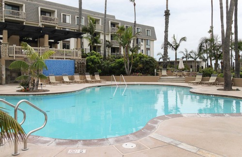 Townsite Condo | North Coast Village Retreat B111 Gated condo w/pool, hot tub, gym, putting green, walk to beach