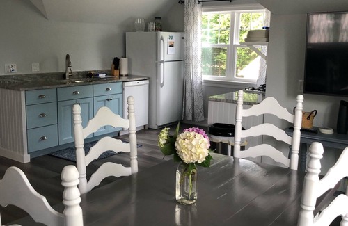 Leland Cottage | North Lake Leelanau carriage/cottage. Sandy beach front on North Lake Leelanau.