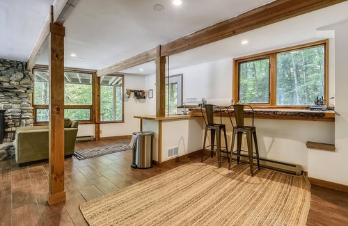West Bridgewater Ski Chalet | Northeast Passage Chalet is a cozy and warm. Wonderful hot tub on the deck and a great big stone fireplace.