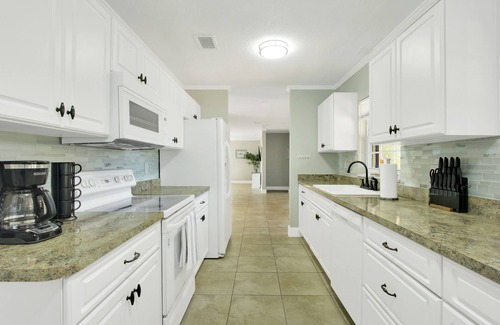 Fort King District House | Ocala Oasis 4BR w/Pool/Cabana/GameRoom/MiniGolf