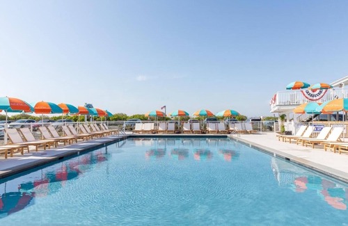 Cape May Hotel | Ocean Breeze & Easy Living – Outdoor Pool, Bikes & Beachfront Relaxation