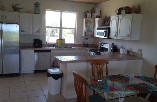 Green Turtle Cay House | OCEAN FRONT Conch Shell-Green Turtle Cay with a dock- 25% FALL DISCOUNT!