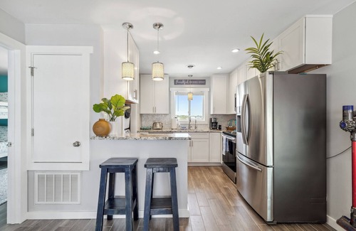 Carolina Beach Condo | Ocean & Lake Views! Walkable! Saltwater Pool! Direct beach access!