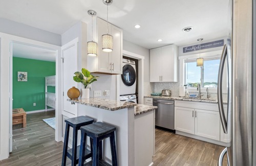 Carolina Beach Condo | Ocean & Lake Views! Walkable! Saltwater Pool! Direct beach access!