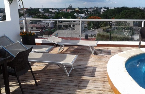 Luis Donaldo Colosio Condo | Ocean view condo with rooftop pool near the beach