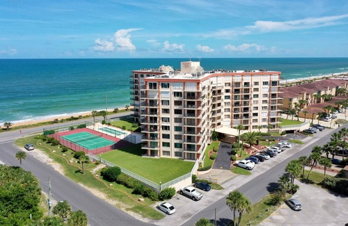 Flagler Beach Condo | Ocean-view condo with balcony, pool, tennis, & shuffleboard - near beach/golf