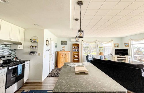 Smith River House | Ocean-view cottage with private beach access, tree house, outdoor fireplace