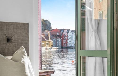 Sandviken Apartment | Ocean-view Haven: Take a swim from your window!