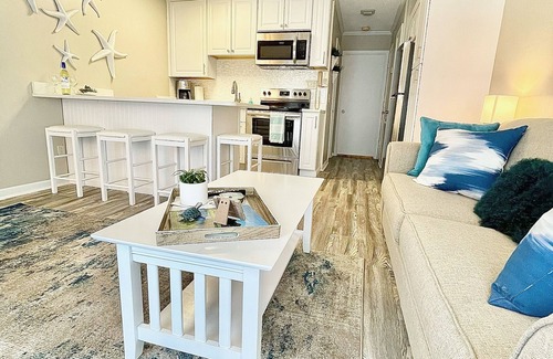 Folly Field Condo | Ocean View! Remodeled! Just Steps to the Beach, large pool and Bar. Gated resort