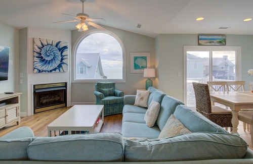 Village of Stump Sound House | Ocean-view 2-story home with fireplace, community outdoor pool & tennis court