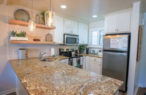 Isle of Palms Condo | Ocean Views! Wonderful Screened Porch w/Exterior Door to Access the Community Pool or Wide Beach