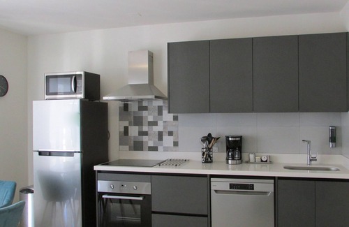 Oranjestad Condo | Oceanfront 1-BDR Condo: King-Bed|Pool|Full-Kitchen|Sofa-Bed|Mini-Beach|Dock