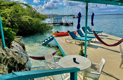 Oranjestad Condo | Oceanfront 1-BDR Condo: King-Bed|Pool|Full-Kitchen|Sofa-Bed|Mini-Beach|Dock