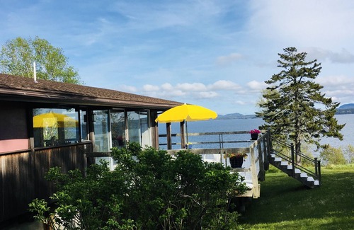 Surry House | Oceanfront 1980's Contemporary . Serene. Pet friendly. Private beach. Sleeps 4.