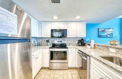 Myrtle Beach Condo | Oceanfront Bliss – Bright Blue Condo with Balcony & Beach Views