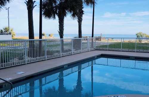 Myrtle Beach Condo | Oceanfront Bliss – Bright Blue Condo with Balcony & Beach Views