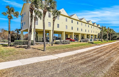New Smyrna Beach Condo | Oceanfront condo with pool, balcony, ocean views, W/D, & central AC