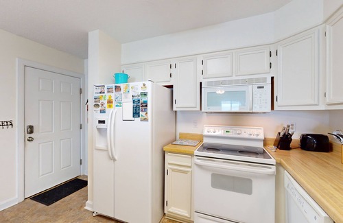 Rodanthe Condo | Oceanfront condo with outdoor pool, W/D BBQ, and balcony