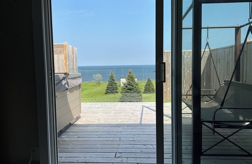 Cormierville House | Oceanfront paradise, 4-bedroom house in Cocagne with hot tub, WiFi, AC.