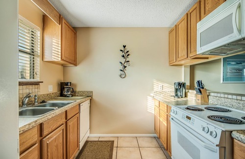 Sugar Beach House | Oceanfront townhouse near beach with pool, balcony, central AC, & washer/dryer