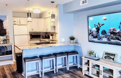 North Ocean City Apartment | Oceanside Haven -Steps to Sand + Indoor Pool + Game Rm - Perfect Beach Getaway