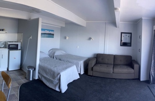 Waihau Bay Apartment | Oceanview downstairs unit at Oruaiti Beach in Waihau Bay
