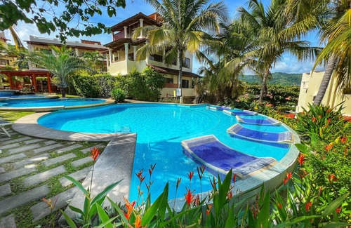 Coco Sunset Hills Condo | Oceanviews on a Budget - Massive Rooftop Patio