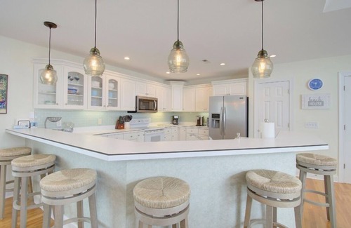 Ocean Isle Beach House | OIB Views! Easy beach access, linens included, double backyard, community pool.