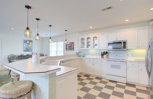 Ocean Isle Beach House | OIB Views! Easy beach access, linens included, double backyard, community pool.