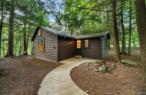 Old Forge Cabin | Old Forge, NY - Secluded Riverfront Cottage with AC, W/D, Walk to Town!