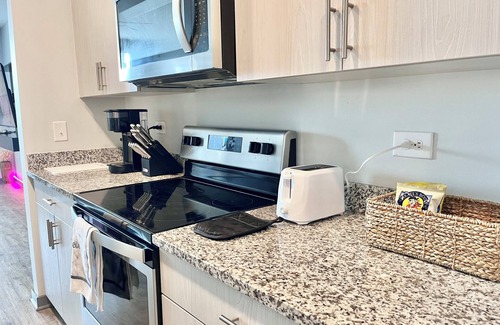 Speedway Apartment | Oliver Capital- Speedway Game Suite