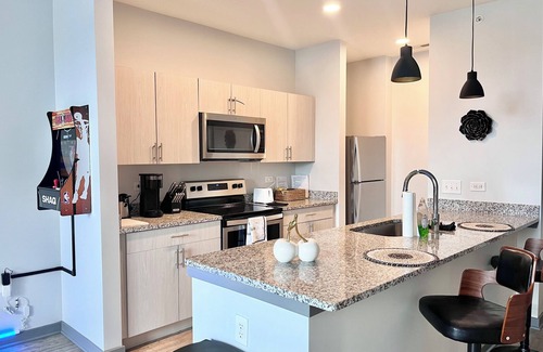 Speedway Apartment | Oliver Capital- Speedway Game Suite
