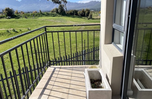 Gordon's Bay Apartment | On a golf estate with Mountain views.n4km from the Beach