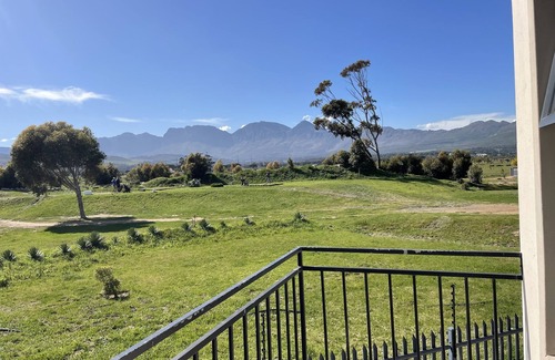 Gordon's Bay Apartment | On a golf estate with Mountain views.n4km from the Beach