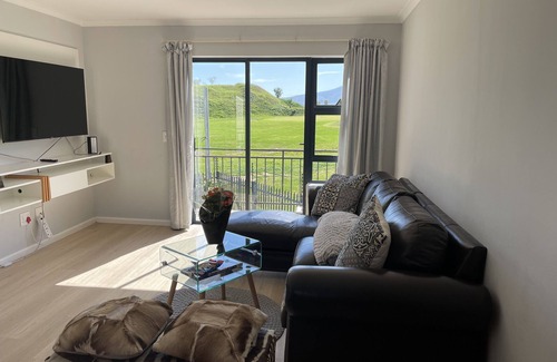 Gordon's Bay Apartment | On a golf estate with Mountain views.n4km from the Beach
