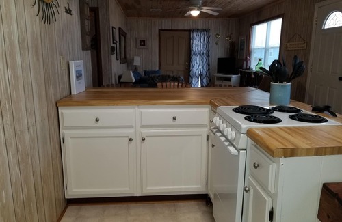Fort Morgan Cottage | On beach living at off beach price! Dog friendly.