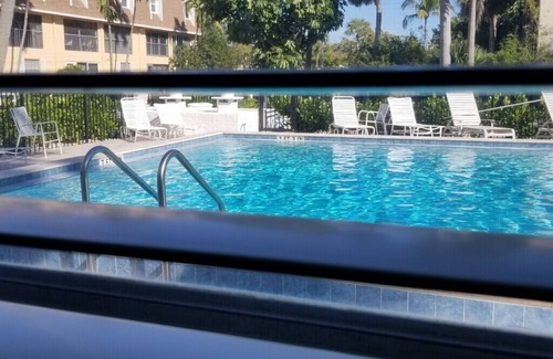 Aqualane Shores Condo | ONE BLOCK to the beach, Restaurants & Shopping!