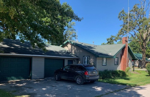 Standish House | One mile east of the Saganing Casino 50 feet from the beach, private boat launch
