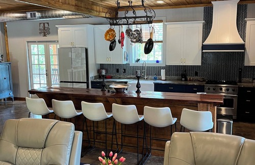 Oxford House | One of a kind gated home with acreage. Minutes from the square. A must see!