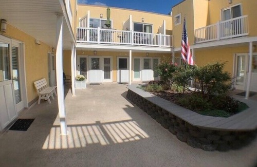 Stone Harbor Condo | ONLY 1/2 block to the beach, shopping, restaurants and entertainment.