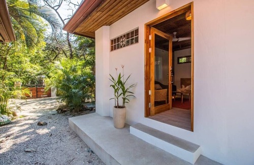 Playa Guiones House | Only steps to the surf and a short walk to yoga, this modern casita sleeps 6.