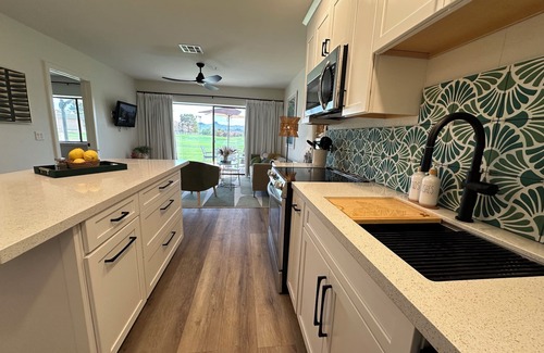 Lake Havasu City Condo | Ooh LaLa! Newly Listed Queens Bay All-Season Resort. On the Greens w/lake view