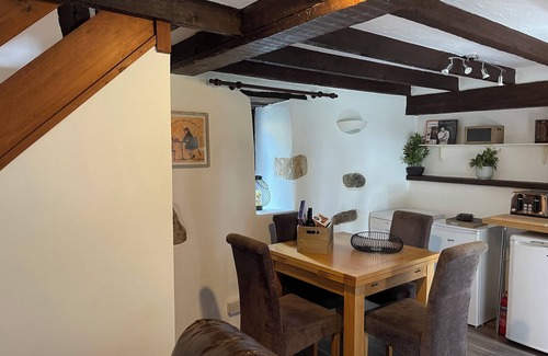 Lanhydrock Cottage | Oozing charm! Character Cottage - Dog Friendly With Luxury Hot tub & Log Burner