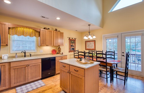 Lake Junaluska House | Open and modern upper-level space with WiFi, central AC, pool, wraparound deck