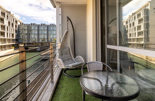 Victoria and Alfred Waterfront Apartment | Opening into a balcony with garden views, the air-conditioned 2bedroom apartment