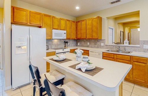 Watersong House | Orange Blossom Hideaway | House in Davenport with a pool and pool spa