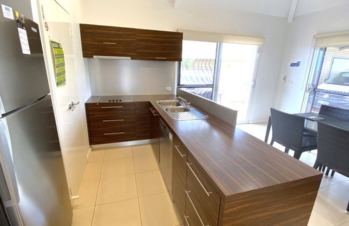 Exmouth Villa | Osprey Holiday Village Unit 104 - Villa with a Pool in the Complex