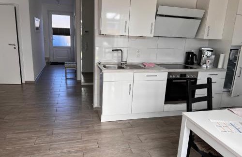 Norden Apartment | Ostfrieslands Perle Ferienwohnung an der Nordseeküste, Sauna, Terrasse, Garten, ruhige Lage, WLAN