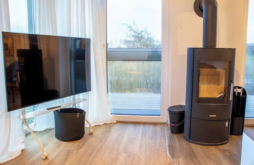 Tossens House | Ostwind - peace and quiet on the dyke. Sauna. Family time.